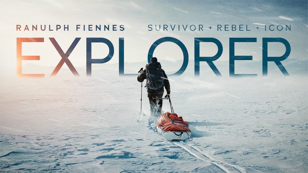 Key art for the film Explorer, showing Ranulph Fiennes hauling a sledge across a snowfield