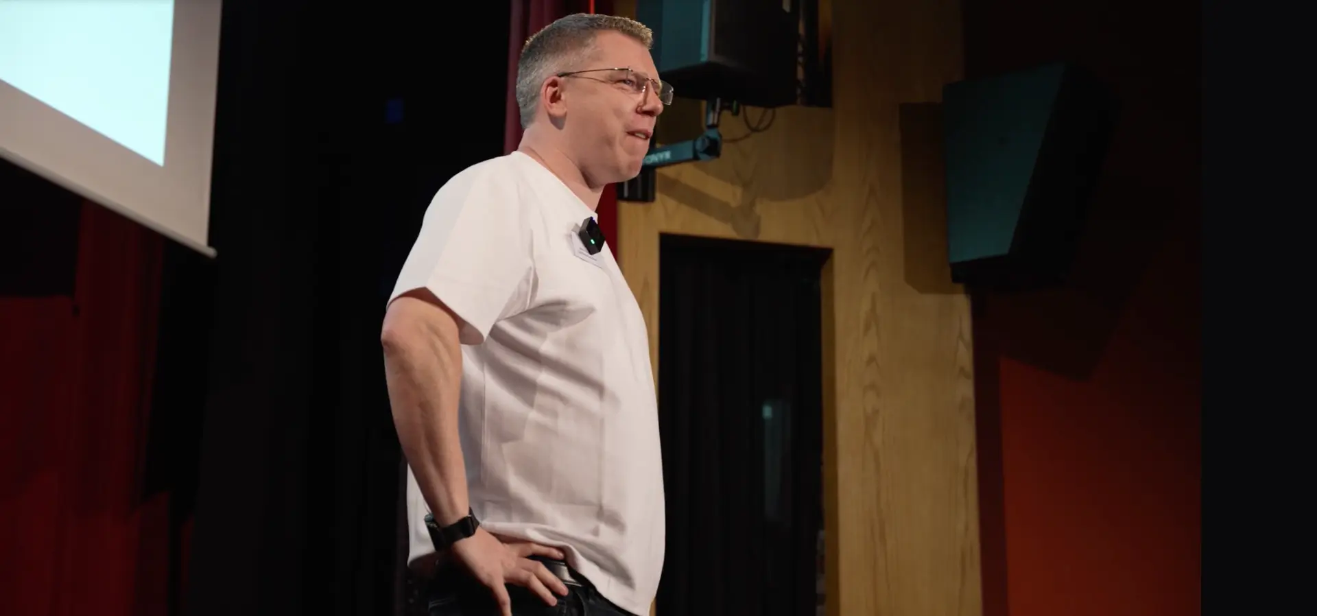 Rich Fitzmaurice speaking on stage at a B2B Marketing United event